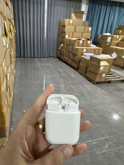 Upright original factory warehouse photo of white wireless earbuds held in their charging case